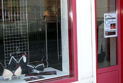 Charlie Morris Band poster in the window of a bra shop in Vully
