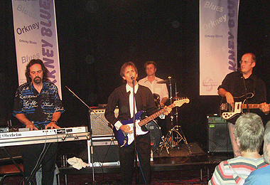 Charlie Morris Band on stage at the Orkney Blues Festival