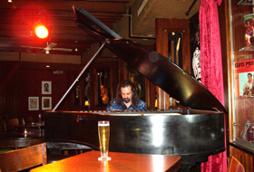 Devin at the grand piano