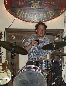 Old Irish tom lifts a pint at the Kerry in New Orleans